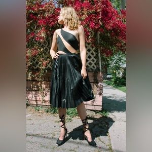 Black vegan leather pleated midi skirt